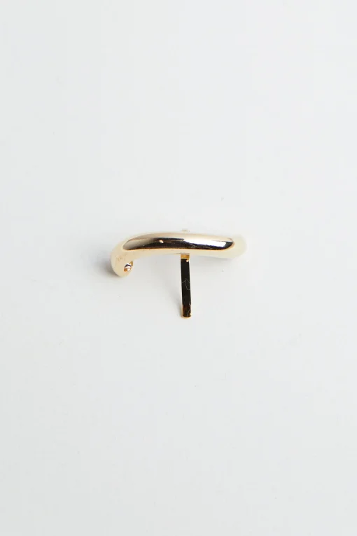ABSTRACT PIPE-SHAPED HAIR CLIP