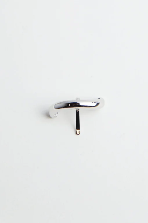 ABSTRACT PIPE-SHAPED HAIR CLIP