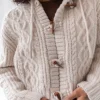 CABLE KNIT HOODED CARDIGAN WITH TOGGLE CLOSURE
