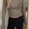 EXPOSED SEAM LONG SLEEVE TOP
