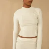 EXPOSED SEAM MOCKNECK TOP