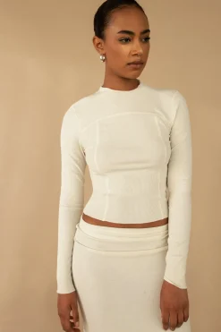 EXPOSED SEAM MOCKNECK TOP