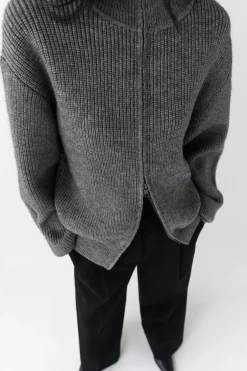 HIGH NECKLINE ZIP UP SWEATER