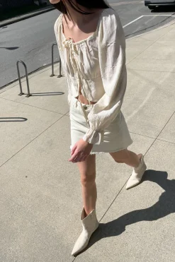 IVORY DENIM MINI SKIRT