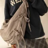LARGE SHOULDER BAG WITH BOWS