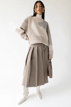 MIDI PLEATED ASYMMETRICAL SKIRT
