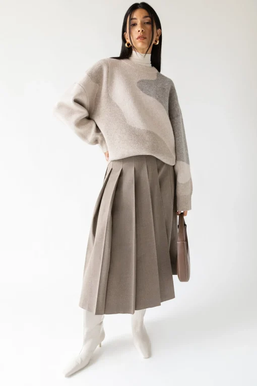 MIDI PLEATED ASYMMETRICAL SKIRT