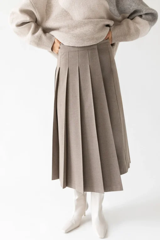 MIDI PLEATED ASYMMETRICAL SKIRT