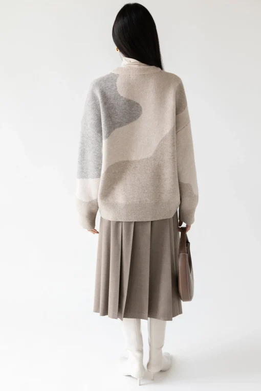MIDI PLEATED ASYMMETRICAL SKIRT