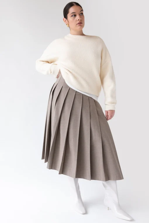MIDI PLEATED ASYMMETRICAL SKIRT