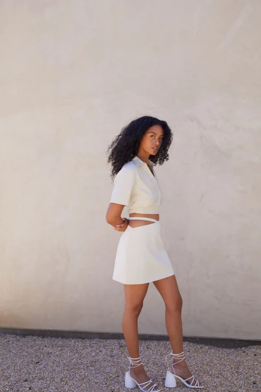 MINI SKIRT WITH CUTOUT WAIST