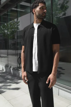 SHORT SLEEVE BUTTON UP SWEATER
