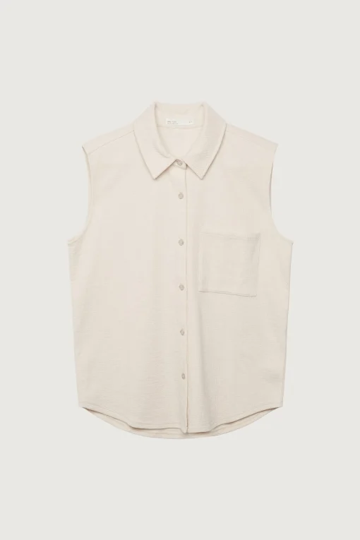 SLEEVELESS OVERSIZED KNIT SHIRT