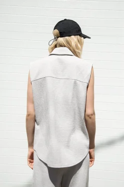SLEEVELESS OVERSIZED KNIT SHIRT