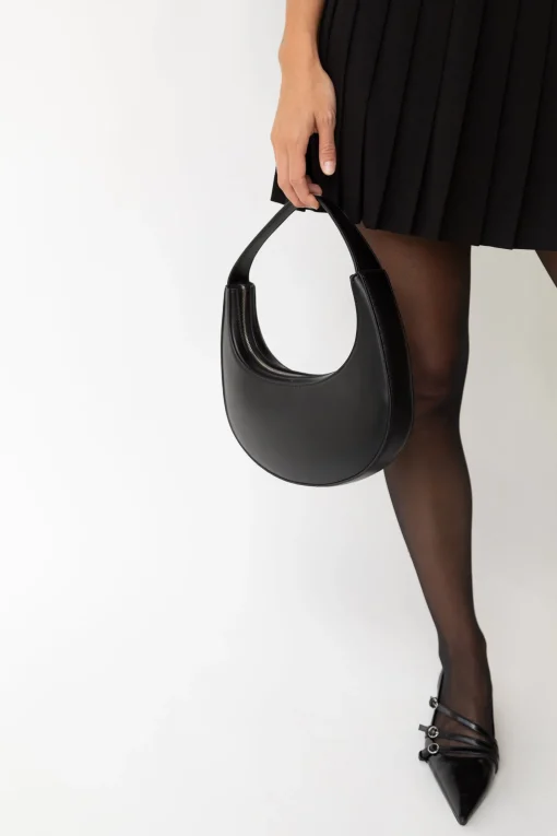SMALL ROUND HAND BAG