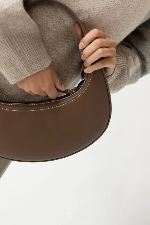 SMALL ROUND HAND BAG