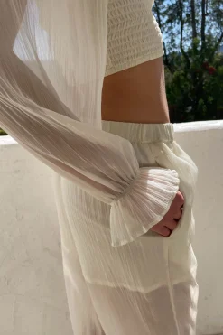 SMOCKED RUFFLE SLEEVE BLOUSE