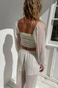 SMOCKED RUFFLE SLEEVE BLOUSE