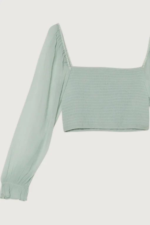 SMOCKED RUFFLE SLEEVE BLOUSE