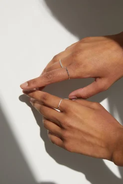 STERLING SILVER RING WITH TINY STONES