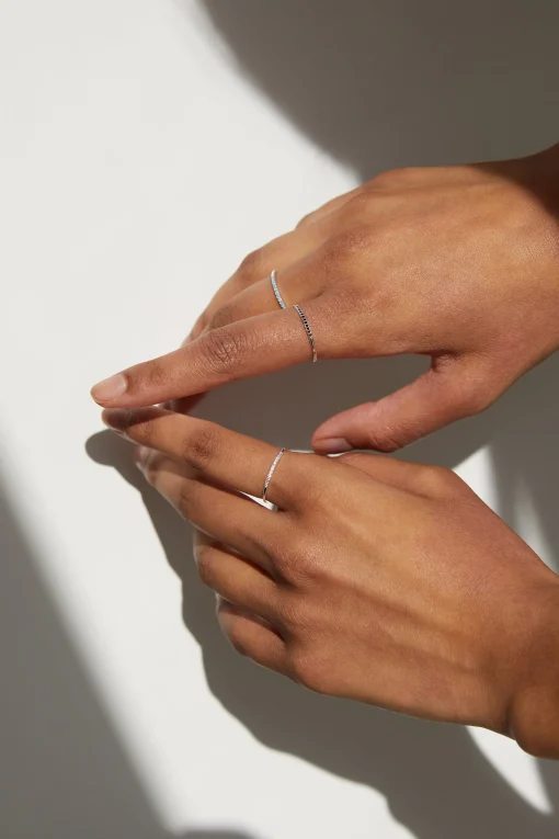STERLING SILVER RING WITH TINY STONES